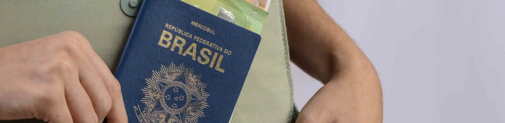 person holding a brazil passport for visa free travel
