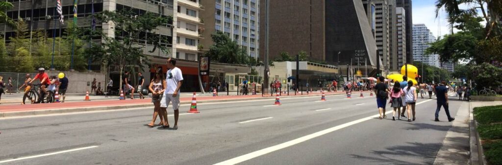 people walking along avenida paulista in sao paulo brazil