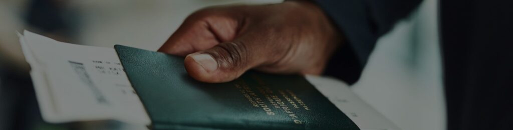 person holding passport to apply for brazil visa extension